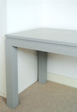 Detail of grey painted table